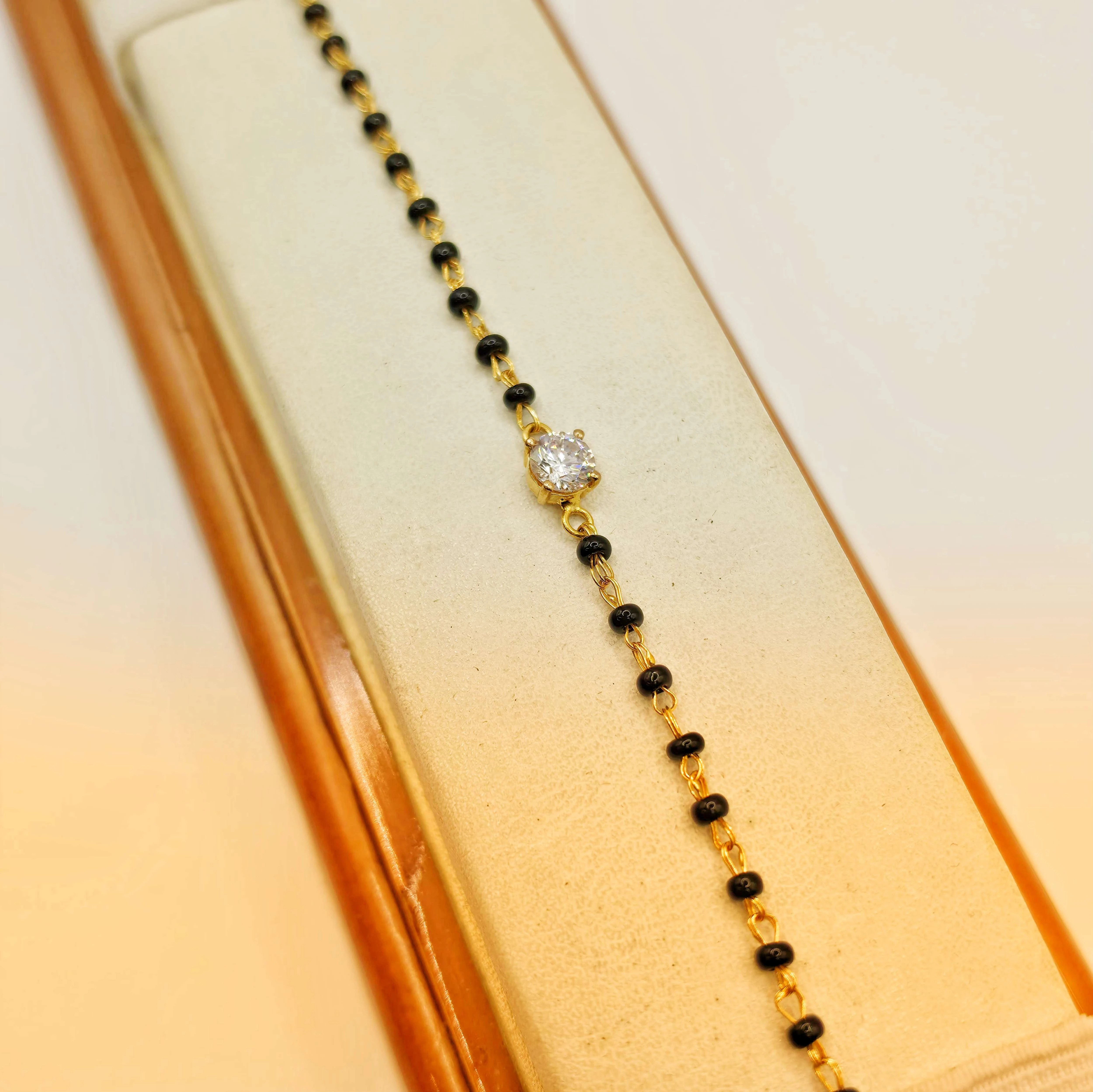 ELEGANT GOLD AMERICAN DIAMOND MANGALSUTRA BRACELET