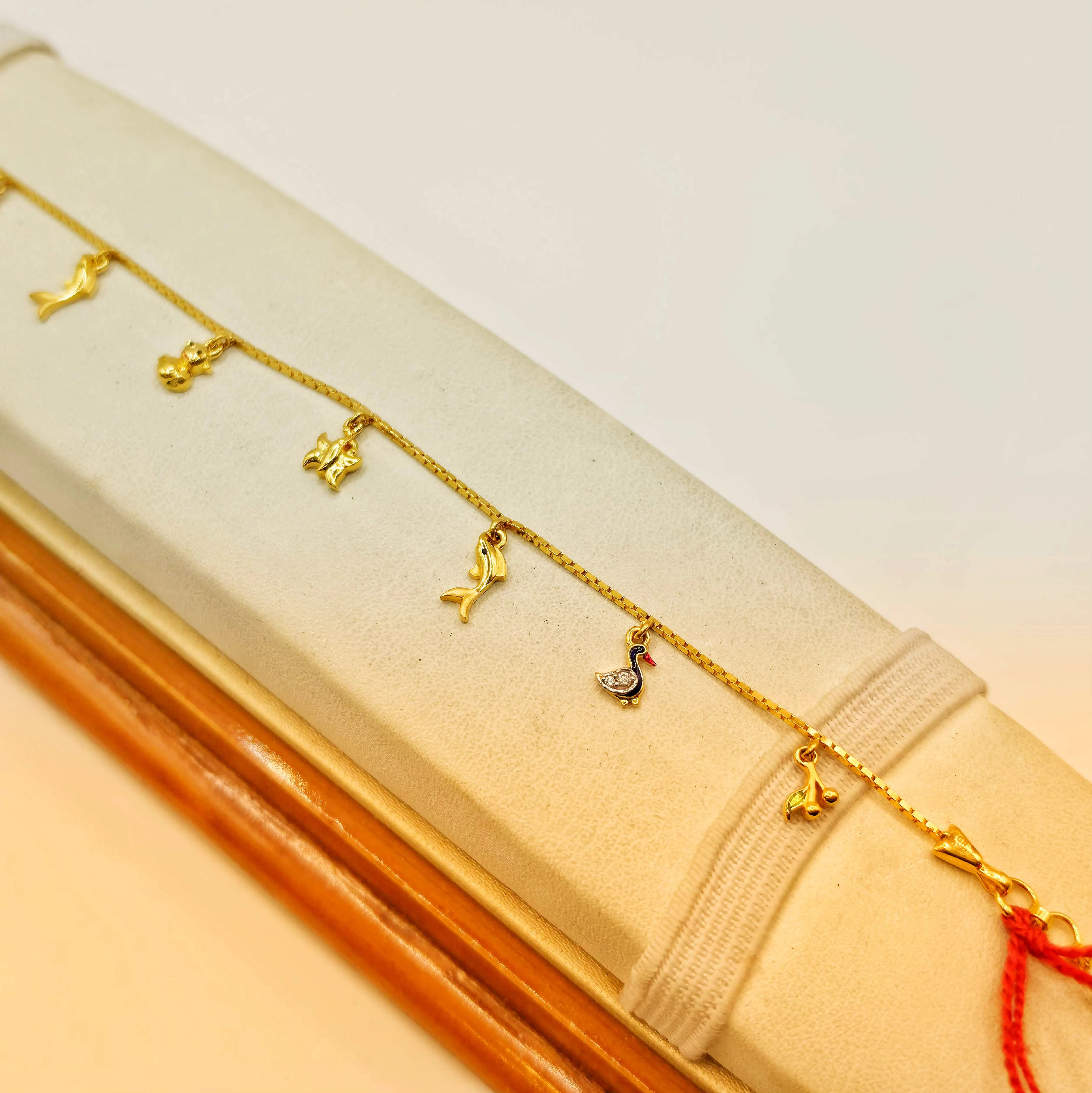 Whimsical 22K (916) Gold Multi-Charm Box Chain Bracelet